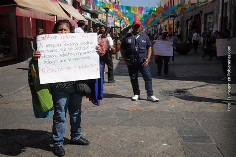 Conflicto familiar y político en Puebla sacude al comercio ambulante; investigan atentado contra líder local, señalando disputas territoriales y poder entre vendedores.